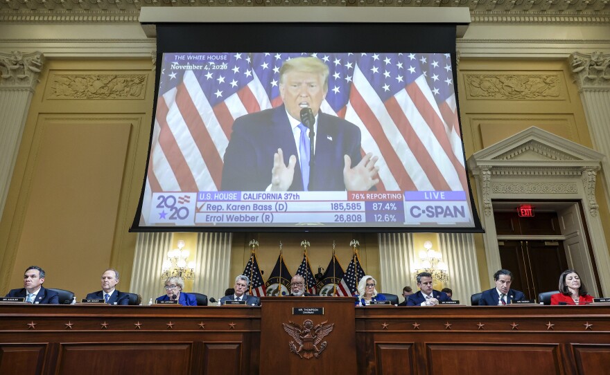 A video of then-President Donald Trump speaking is displayed as the House select committee investigating the Jan. 6 attack on the U.S. Capitol holds a hearing on Capitol Hill in Washington, Thursday, Oct. 13, 2022.