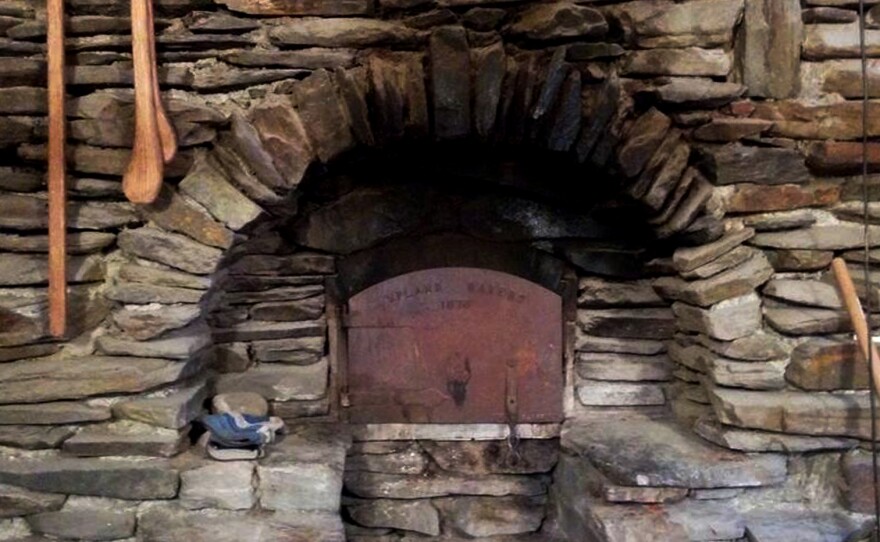 The fieldstone covering of their wood-fired oven.