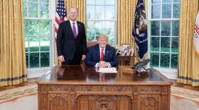 San Diego Mayor Kevin Faulconer poses with President Trump for a photo in the Oval Office at the White House, June 18, 2019.