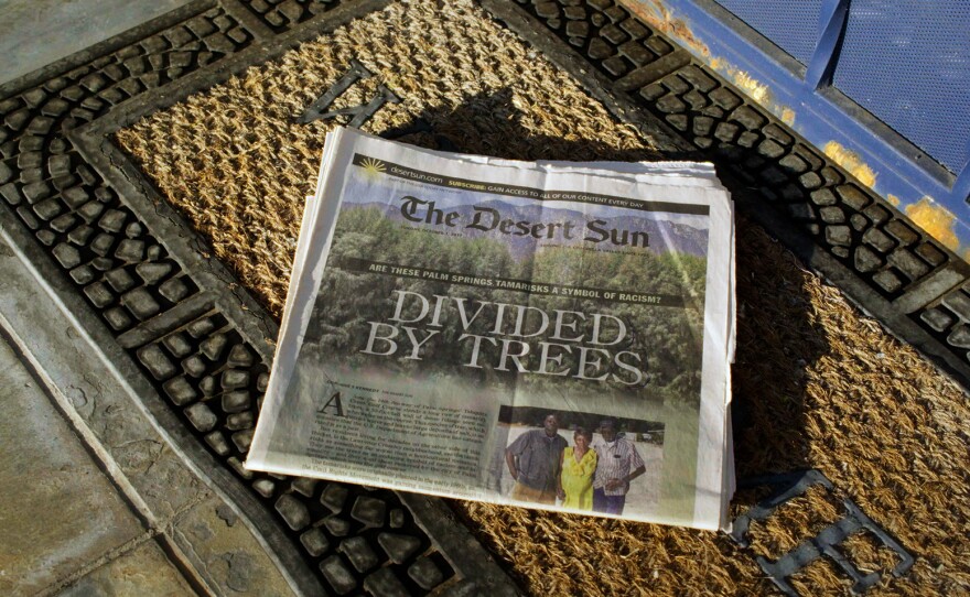 One of several articles featured on the cover of the The Desert Sun that sparked international media attention and backlash against the so-called 'racist trees' that were planted in Palm Springs in the late 1950's.
