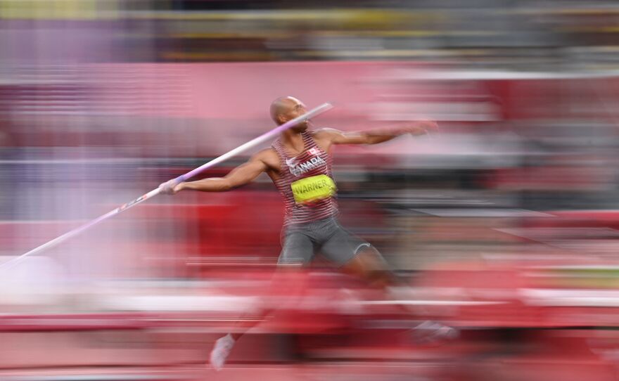 Canada's Damian Warner competes in the men's decathlon javelin throw on August 5. Warner won gold and set a new decathlon Olympic record.