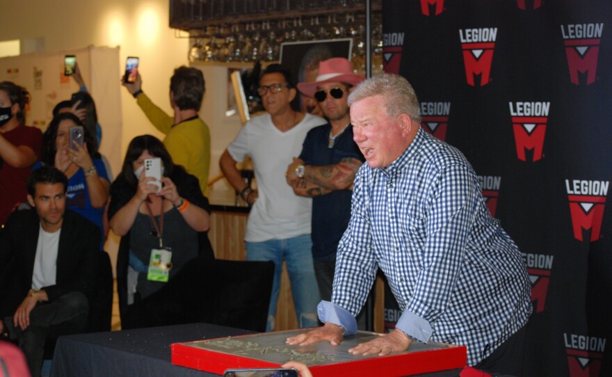 William Shatner imprinting his hands in cement at the William Shatner handprint ceremony at the lobby of Theatre Box San Diego. July 21, 2022.