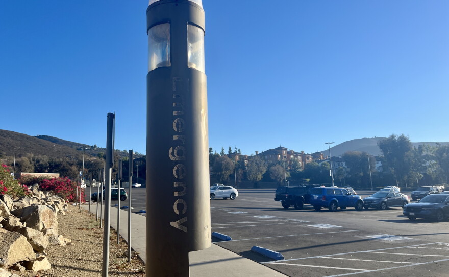 A blue light emergency pole on CSU San Marcos is positioned in the corner of a parking lot, Oct. 9, 2026.
