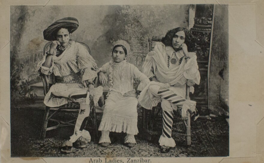 <em>Arab Ladies, Zanzibar</em> by A.C. Gomes & Son. Photograph taken before 1900; postcard printed 1910.