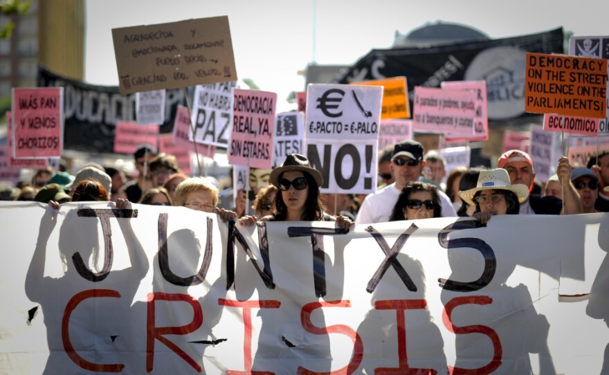 Thousands demonstrate outside the Spanish parliament in Madrid last month in a protest against rampant unemployment and biting austerity measures.