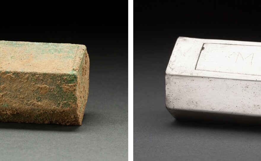 A well-preserved silver box, thought to be a Roman Catholic reliquary, rested atop the coffin of a man believed to be Capt. Gabriel Archer. The box was an unexpected find at the site of the 1608 Anglican church, suggesting the colonist retained his Roman Catholic faith, perhaps in secret.