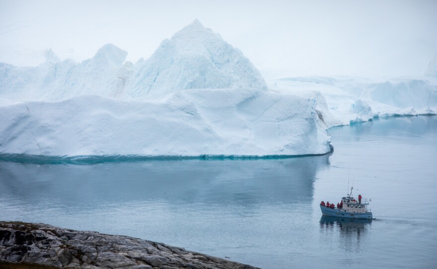 An iceberg in Ilulissat, Greenland. Ice sheets in Greenland and Antarctica are melting rapidly, and that melt will accelerate as the Earth heats up.
