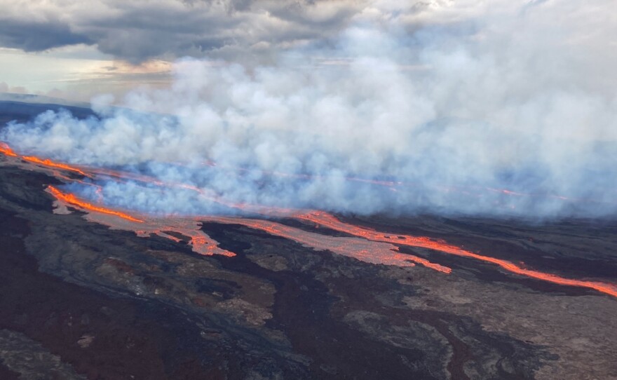 In this aerial photo released Monday by the U.S. Geological Survey, the Mauna Loa volcano is seen erupting from vents on the Northeast Rift Zone on the Big Island of Hawaii.