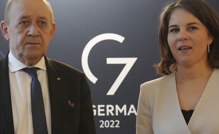 Annalena Baerbock, Foreign Minister of Germany, welcomes Jean-Yves Le Drian, Foreign Minister of France, for bilateral talks at the Schlossgut during the the summit of foreign ministers of the G7 Group of leading democratic economic powers at the Weissenhaus resort in Weissenhaeuser Strand, Germany, Friday, May 13, 2022.