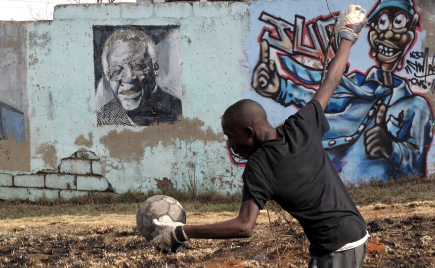 Playing the game in Soweto, South Africa.