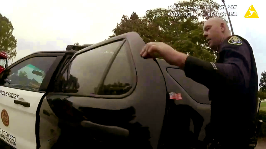 San Diego Police Officer Timothy Romberger is shown on police body camera video, San Diego, Calif. Aug. 6, 2017.