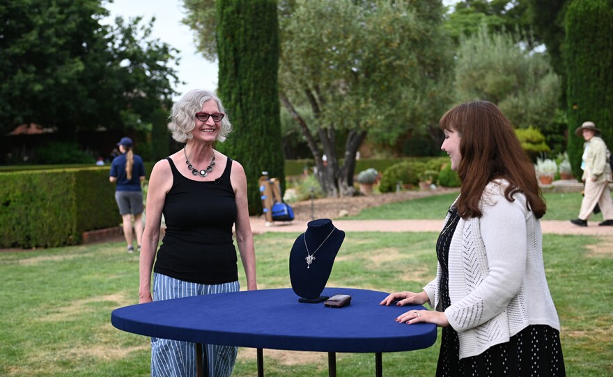 Kailtlin Shinnick (right) appraises a Belle Epoque diamond & platinum necklace, ca. 1905, in Woodside, Calif.