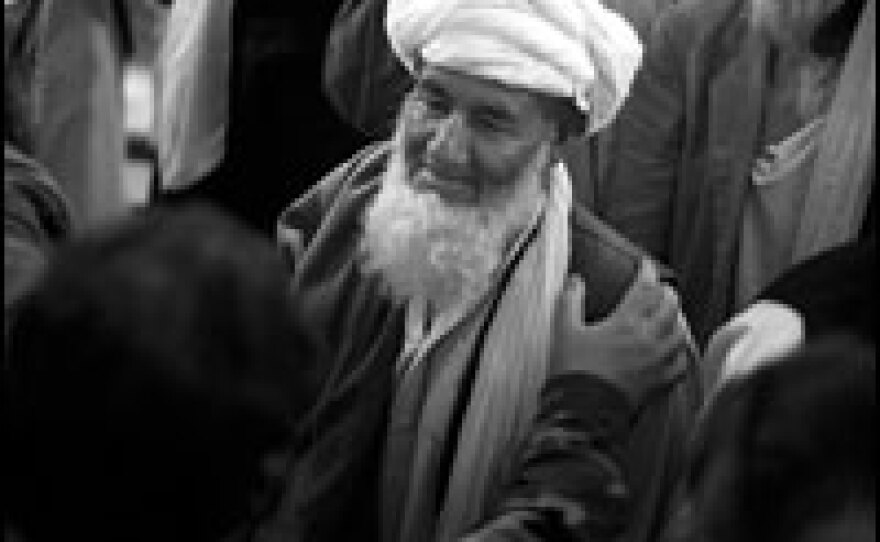 The tribal elders say goodbye to members of the U.S. Special Forces after the <em>shura.</em>