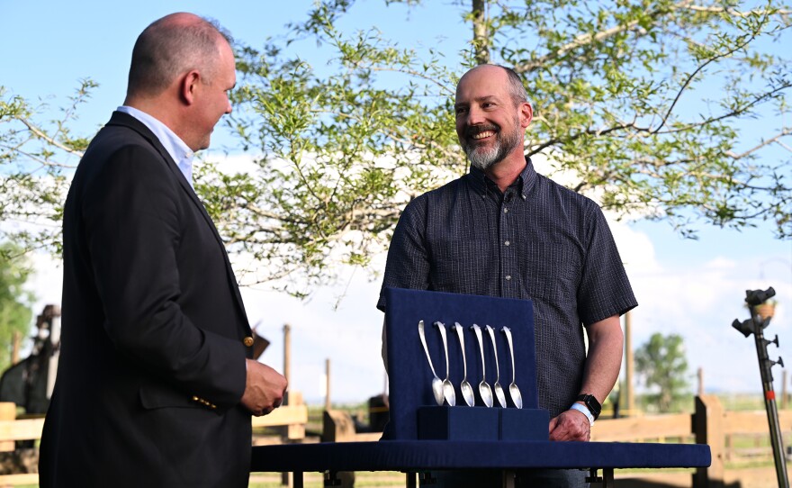 Christopher Barber (left) appraises a Paul Revere Jr. silver tablespoons, ca. 1796, in Littleton, Colorado. ANTIQUES ROADSHOW “Denver Botanic Gardens Chatfield Farms, Hour 2” airs Monday, March 31 at 8/7C PM on PBS.