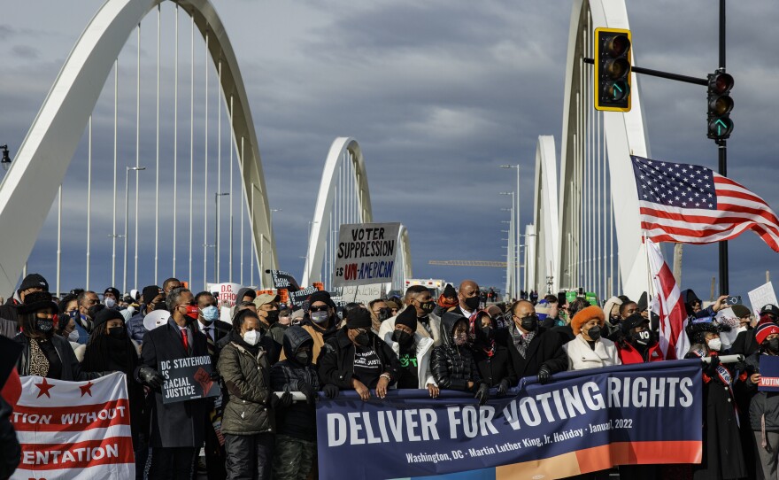 From center left to right: Yolanda Renee King, Arndrea Waters King and Martin Luther King III, lead the annual D.C. Peace Walk: Change Happens with Good Hope and a Dream across the Frederick Douglass Memorial Bridge for Dr. Martin Luther King Day in Washington, D.C.