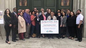 Members of the San Diego Rapid Response Network gather outside a church on Boston Avenue, Nov. 11, 2018.