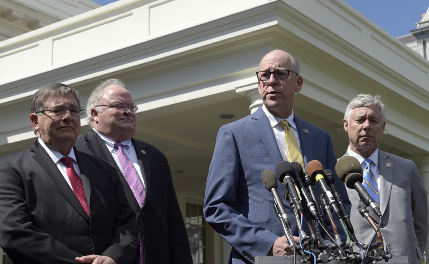 Rep. Greg Walden, R-Ore. (second from right), speaks to reporters outside the White House on Wednesday following a meeting with President Trump on health care. With him are Reps. Michael Burgess (from left), R-Texas; Billy Long, R-Mo.; and Fred Upton, R-Mich.