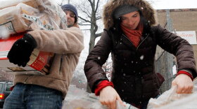Ben Ochstein and Julie Brown stocked up on fire logs at Frager's Hardware in Washington as snow began to fall in earnest Feb. 10. As hardware stores replenish supplies sold in the wake of recent snowstorms, the economy stands to benefit.