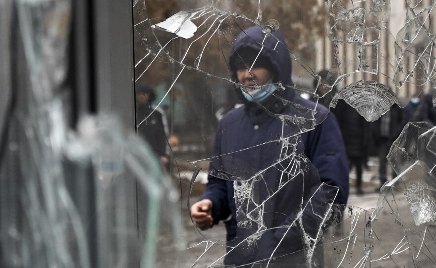 Demonstrators denouncing the doubling of prices for liquefied gas, among other grievances, have clashed with police in Kazakhstan's largest city and held protests in about a dozen other cities in the country.