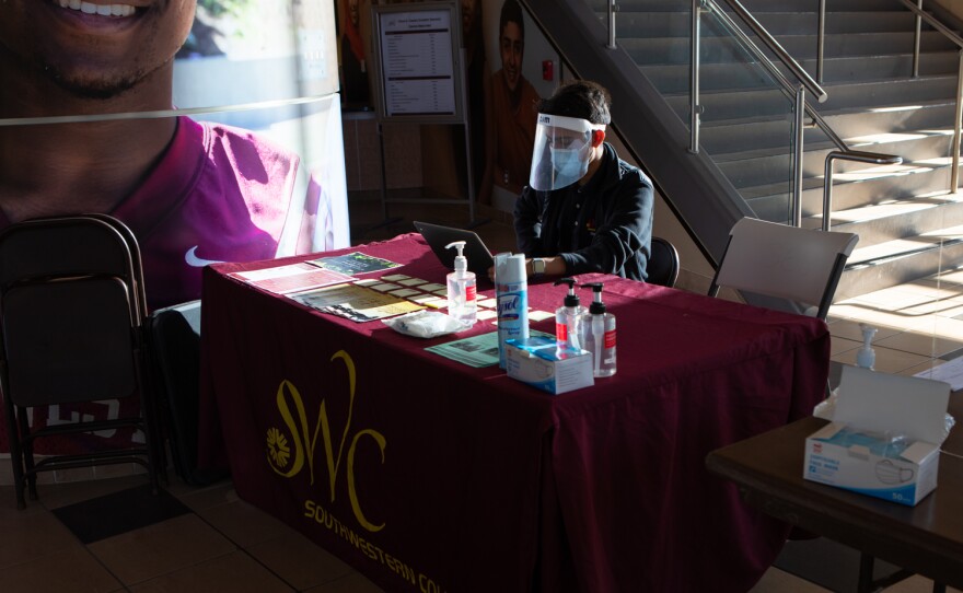 Ivan Luna works at his on campus job at Southwestern College in Chula Vista. Dec. 2, 2021.