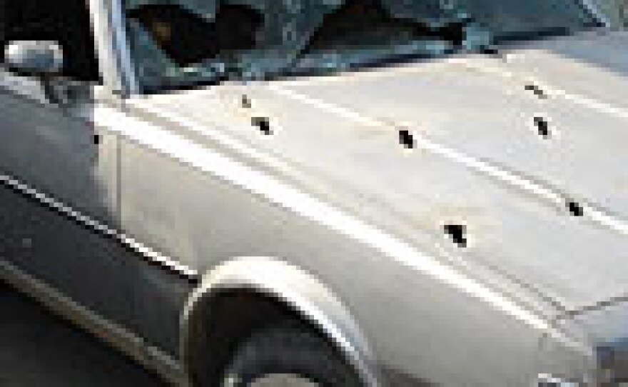 Dozens of bullets hit the car in which four people were killed near Tikrit on Jan. 3. One passenger survived by ducking below the dashboard.