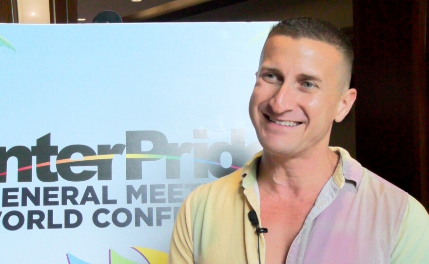 San Diego Pride Executive Director Fernando Lopez is shown being interviewed in the lobby of the Westin Gaslamp on Oct. 26, 2023.