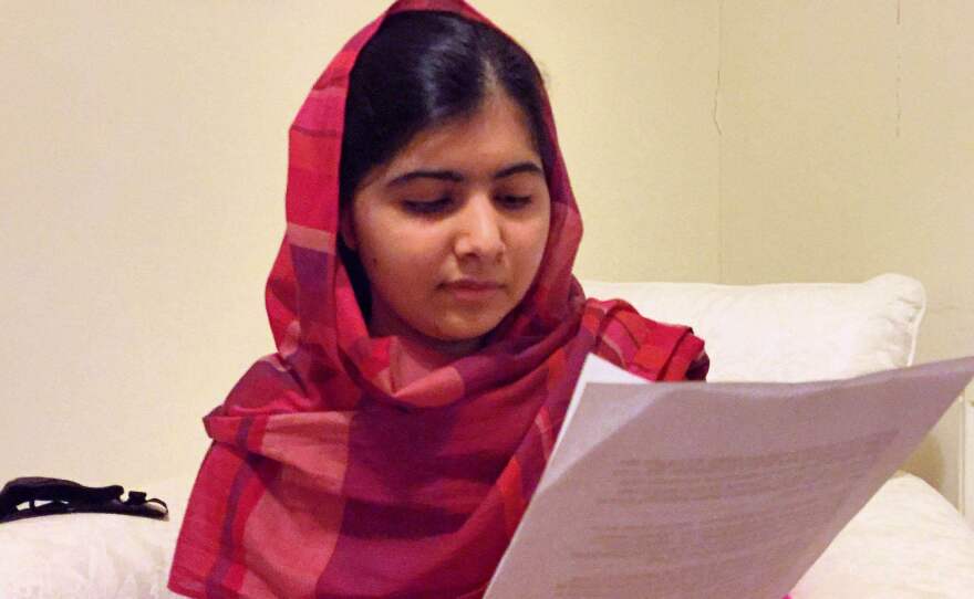 At her home in the U.K., Malala Yousafzai reads her letter to the missing Nigerian schoolgirls.