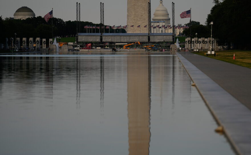 The U.S. Capitol and the Washington Monument are reflected in the Lincoln Memorial Reflecting Pool Thursday, June 25, 2026, in Washington.