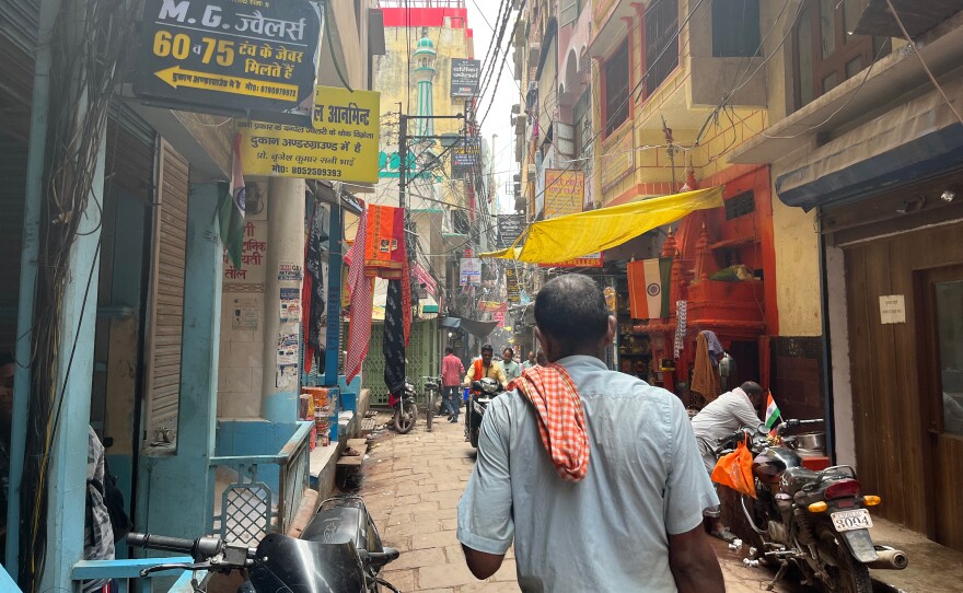 A narrow lane in northern India's Varanasi or Banaras, as it's also called. The city is the epicenter of Hinduism but is a mixture of different cultures and faiths.