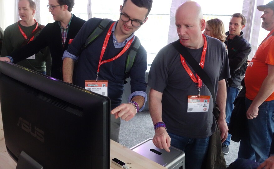 SXSW 2013 festival attendees test out Leap Motion's motion-controlled device, which allows users to interact with computers by gesturing.