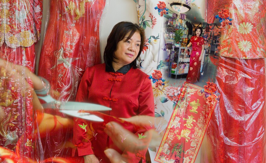 Lisa Lai (黎麗莎), 65, who now owns a cheongsam shop in Philadelphia's Chinatown, left Hong Kong to run a clothing factory in New York City, in 1994.