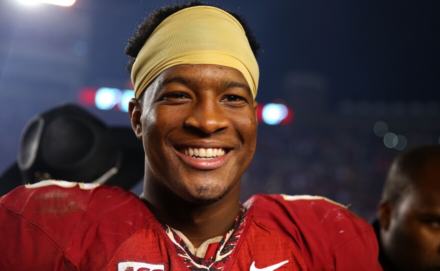 Florida State University quarterback Jameis Winston won the 2013 Heisman Trophy as college football's best player. He's shown here in a Nov. 2 game against Miami.