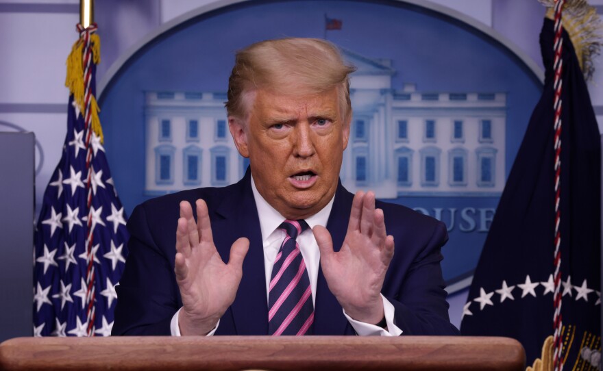 President Trump speaks Friday at a news conference at the White House. He has made fast-tracking a vaccine against the coronavirus a core tenet of his reelection pitch.