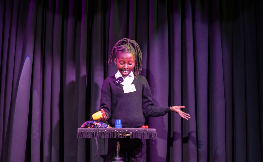 Aspiring magician Kungentanda Ndenetya performs during the annual junior magic contest at the Cape Town College of Magic.