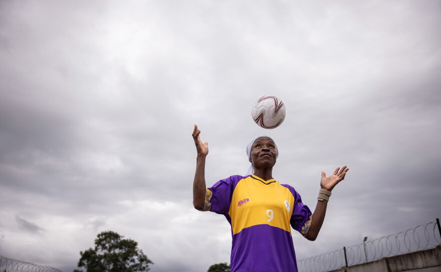 Nomsa Mashego, a 58-year-old grandmother of 2, is a member of South Africa's Mbombela team. She won the "most promising player of the tournament." Mashego has been playing soccer for 10 years. In 2006 she was partially paralyzed after a stroke and she says that her arms and leg are now 100% "because I play ball." Thinking of her own mortality, she says, "It's better to play ball than go to ground," she says.