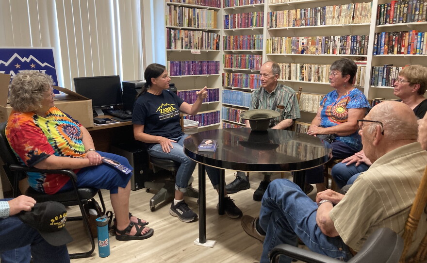 In this undated photo from the campaign, independent congressional candidate Sarah Zabel campaigns with community members in Grangeville, Idaho.