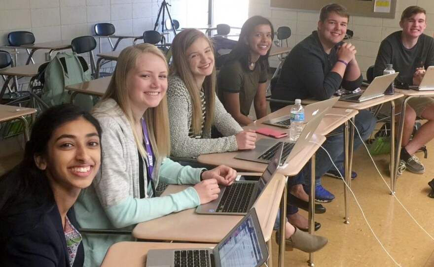 Students Gina Mathew (from left), Kali Poenitske, Maddie Baden, Trina Paul, Connor Balthazor and Patrick Sullivan at Pittsburg High School in Pittsburg, Kan. When reporters for the student newspaper there dug into the credentials offered by their new principal, they found issues that led to her resignation.