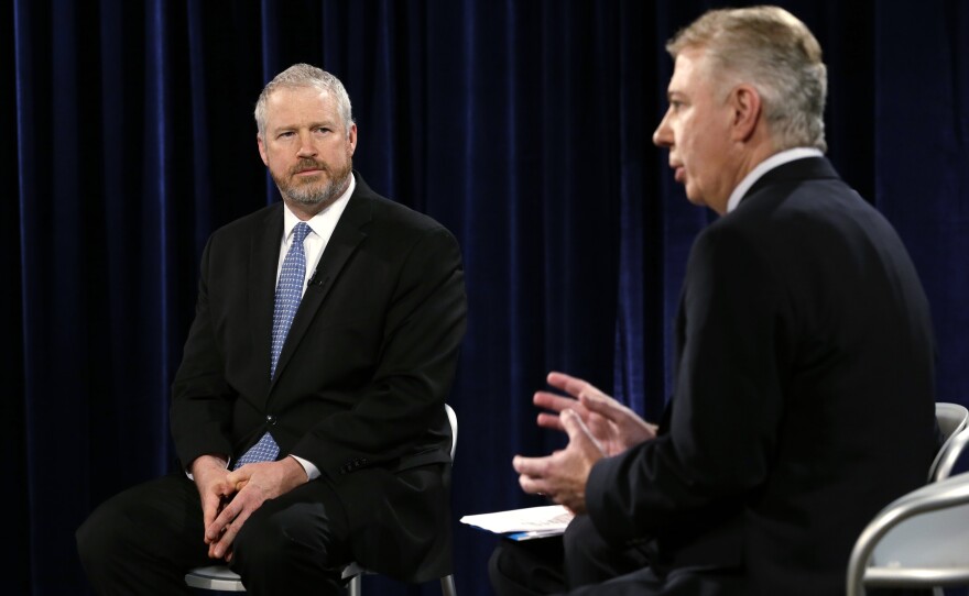 Seattle Mayor Mike McGinn (left) listens as state Sen. Ed Murray answers a question during a debate in their race for mayor on Oct. 9.