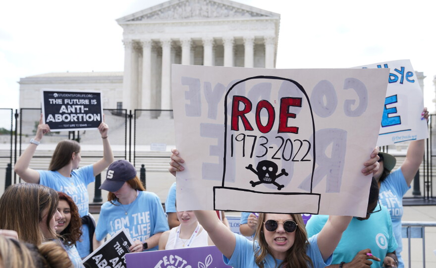 Abortion opponents demonstrate outside the Supreme Court in Washington on June 24, 2022 the day the court decided Dobbs v. Jackson Women's Health Organization. 