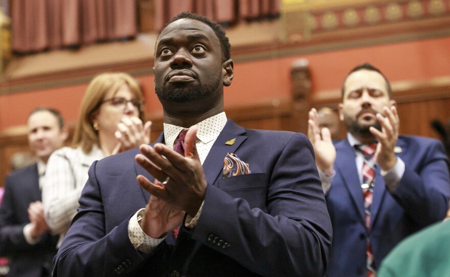 State Rep. Quentin Williams, D-Middletown, applauds during Connecticut Gov. Ned Lamont's state of the state address, Wednesday, Jan. 4, 2023, in Hartford, Conn. Williams was killed overnight in a wrong-way highway crash after having attended the governor's inaugural ball hours and after having been sworn in to a third term, House Democratic leaders said Thursday.