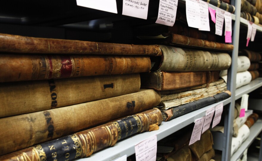 Local records at the Columbus-Lowndes Public Library. Students in Yarborough's U.S. History class study these primary documents as part of a yearlong project.