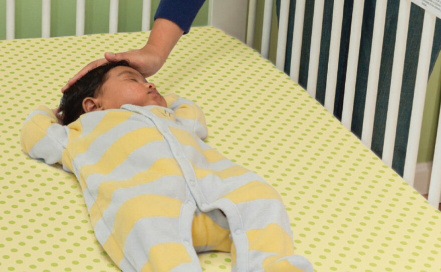 The NIH recommends avoiding bedding for infants.