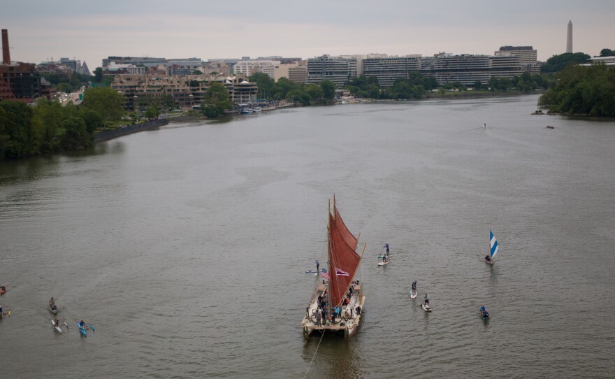 The Hokule'a, a voyaging canoe built to revive the centuries-old tradition of Polynesian exploration, makes its way up the Potomac River in Washington, D.C. Sailed by a crew of 12 who use only celestial navigation and observation of nature, the canoe is two-thirds of the way through a four-year trip around the world.