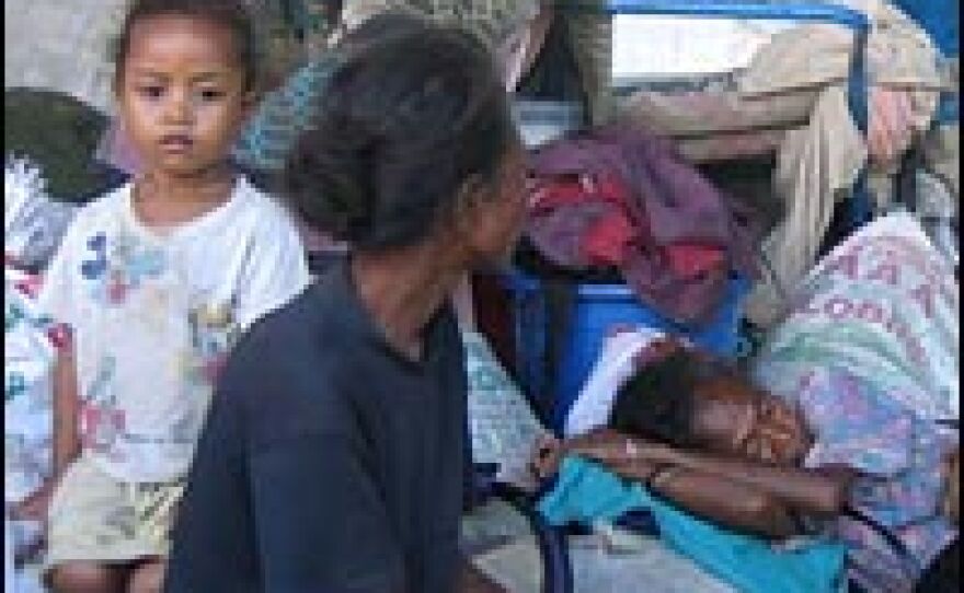 Some of the estimated 100,000 people who have fled their homes because of the violence in East Timor are staying in the gym of Dom Bosco Catholic Church in Dili.