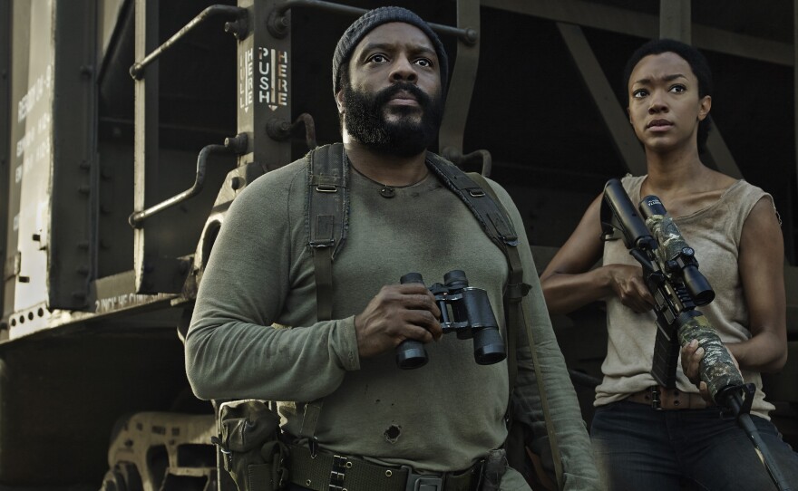 Chad Coleman, left and Sonequa Martin-Green star as Tyreese and Sasha on AMC's The Walking Dead.