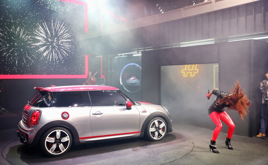 Singer Natalie La Rose helps to introduce the Mini John Cooper Works Concept car at the North American International Auto Show on Tuesday in Detroit.