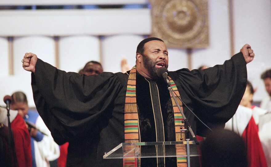 Grammy-winning gospel singer Andrae Crouch sings during a Sept. 1996 service at  Christ Memorial Church in Pacoima, Calif. Crouch followed his father, who founded the church in 1951, and brother, who died in April 1996, to became the pastor at the church. He eventually shared the position with his twin sister, Sandra.
