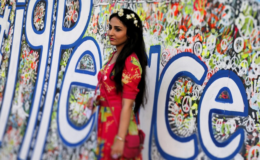 An Iraqi woman attends a festival commemorating the International Day of Peace in Baghdad on Monday.