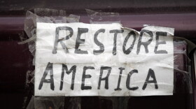 A homemade bumper sticker on the back of a car during a Tea Party rally in Concord, N.H., where GOP presidential candidate Mitt Romney appeared on Sept. 4.
