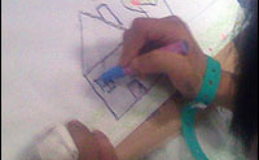When asked to draw something that made them happy, most of the children drew pictures of their houses.